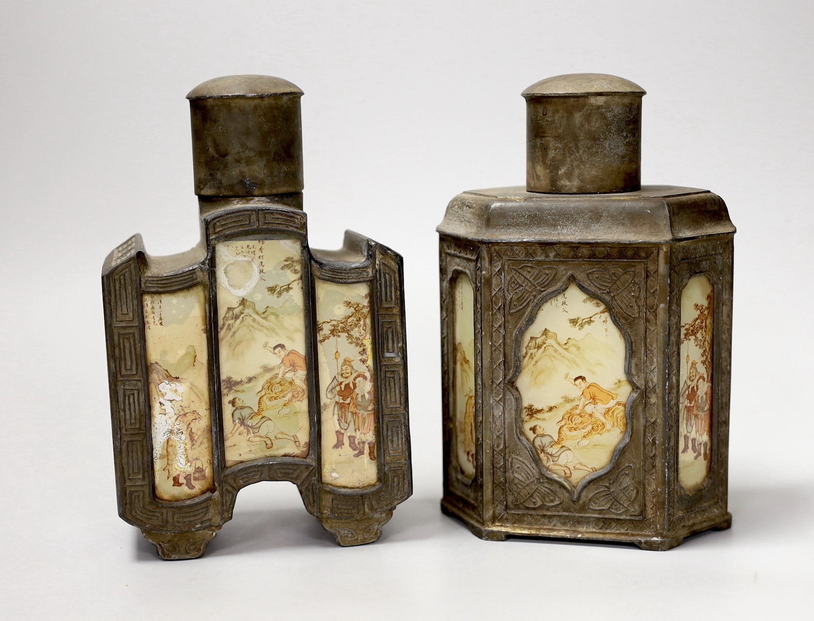 Two Chinese pewter tea caddies with glass panelled decoration. 18cm high
